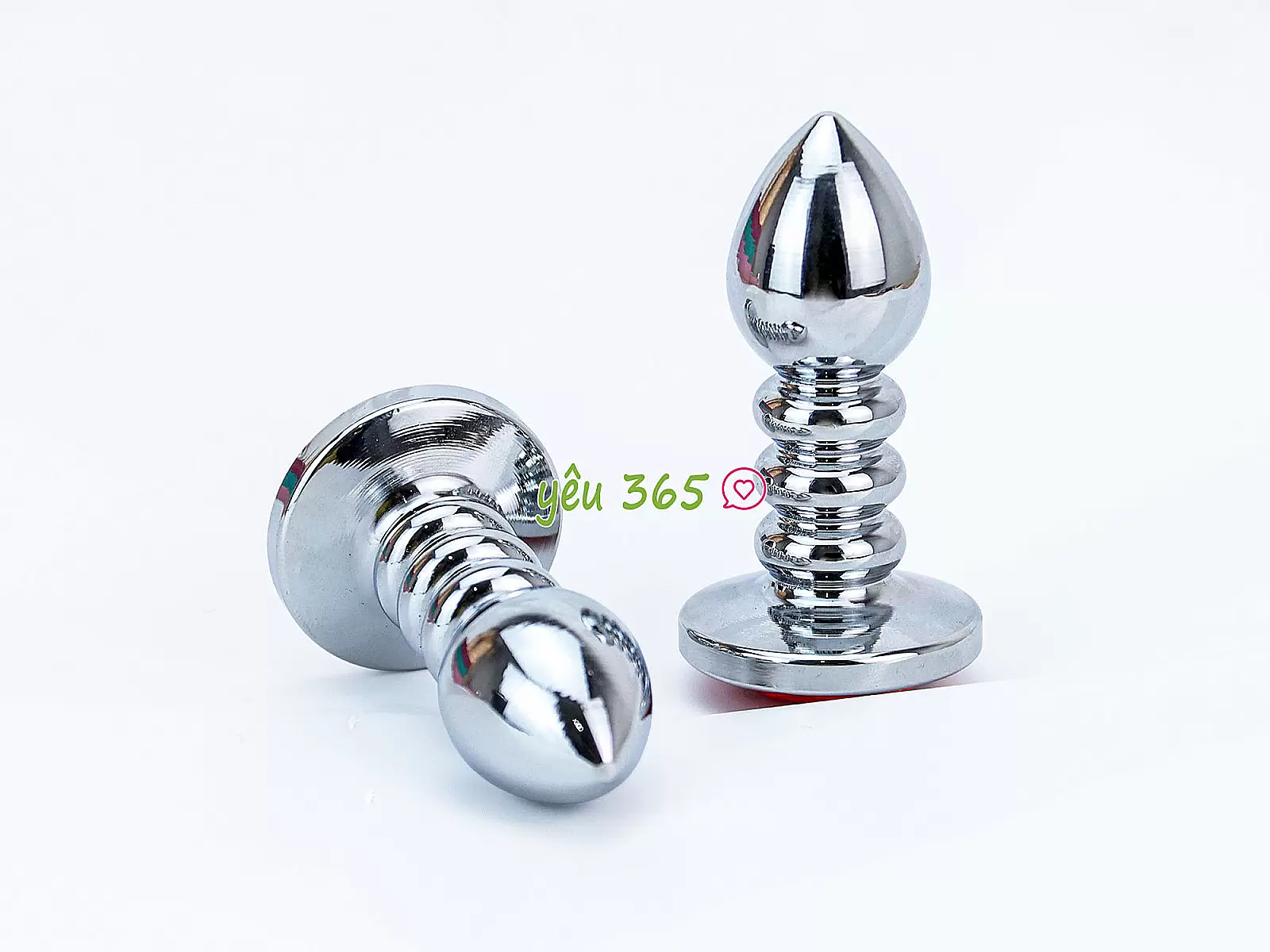 Đồ chơi kích hậu Inox xoắn ốc đuôi pha lê màu cam