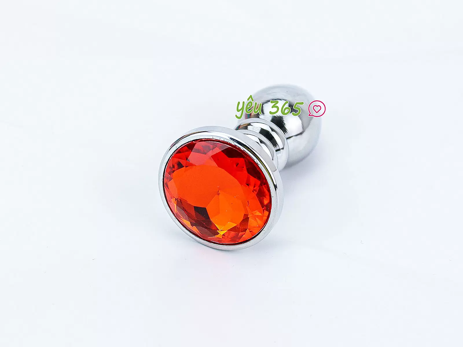 Đồ chơi kích hậu Inox xoắn ốc đuôi pha lê màu cam